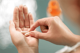 Pills in a hand