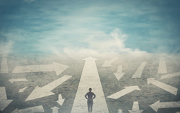Person walking on path with arrows pointing many directions