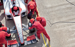 Pit crew working on racecar