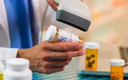 Doctor with Pill Bottle